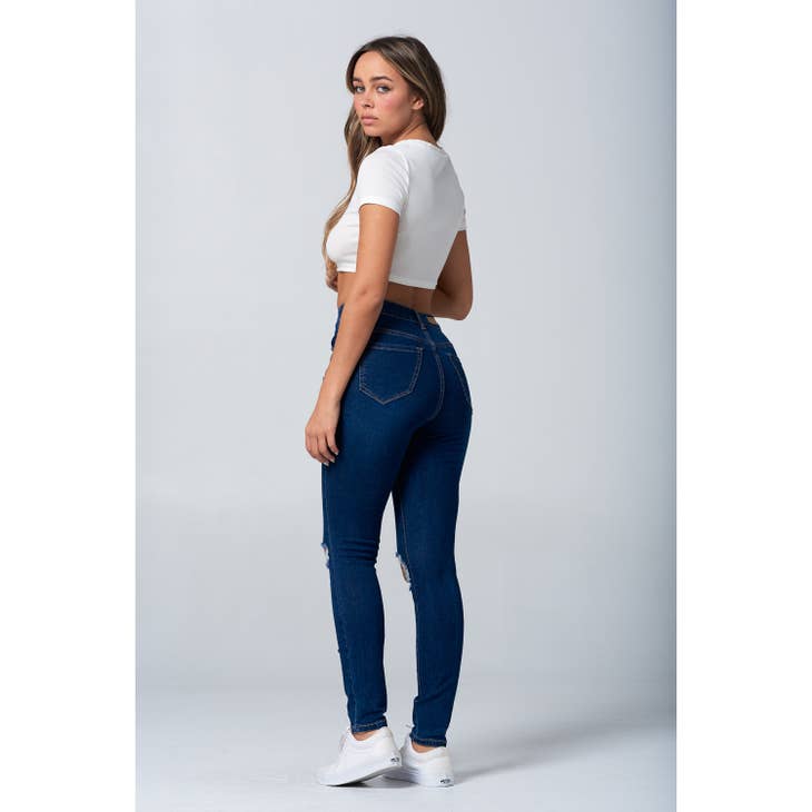 Jean skinny taille haute d'aspect usé à extensibilité extrême